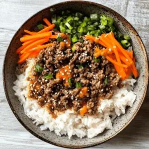 Whip up a delightful dinner with these Ground Beef Teriyaki Rice Bowls! Featuring tender ground beef, crunchy veggies, and a savory teriyaki sauce, this recipe brings Asian-inspired flavors right to your table. Perfect for quick weeknight meals or a fun family dinner. Save this pin for a tasty dish you'll want to make again and again!