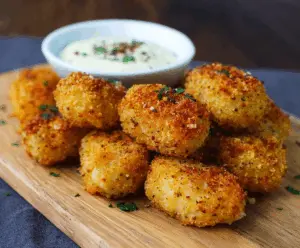 Delicious smoked Gouda mac and cheese bites served hot with a crispy exterior.