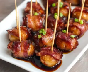 Delicious bacon-wrapped water chestnuts appetizer, crispy and savory.