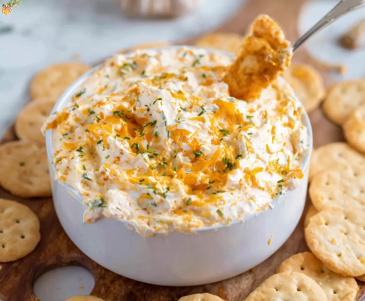 Creamy Cheddar Ranch Dip served with fresh veggie sticks for a tasty appetizer.