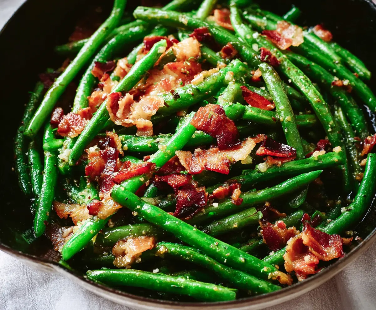 Fresh green beans cooked with crispy bacon for a delicious side dish