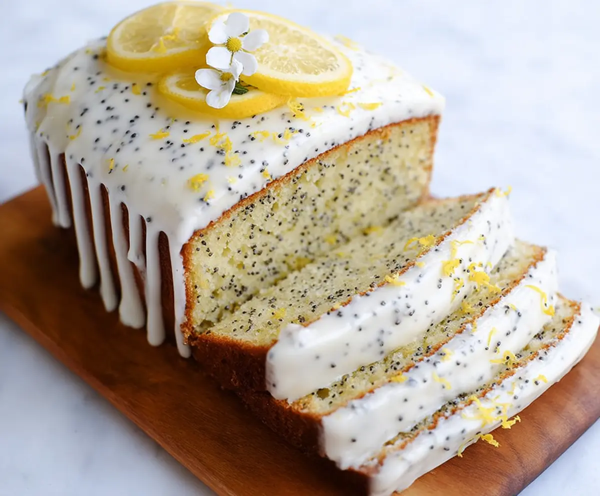 Delicious Lemon Poppy Seed Cake with a golden crust and lemon slices on top